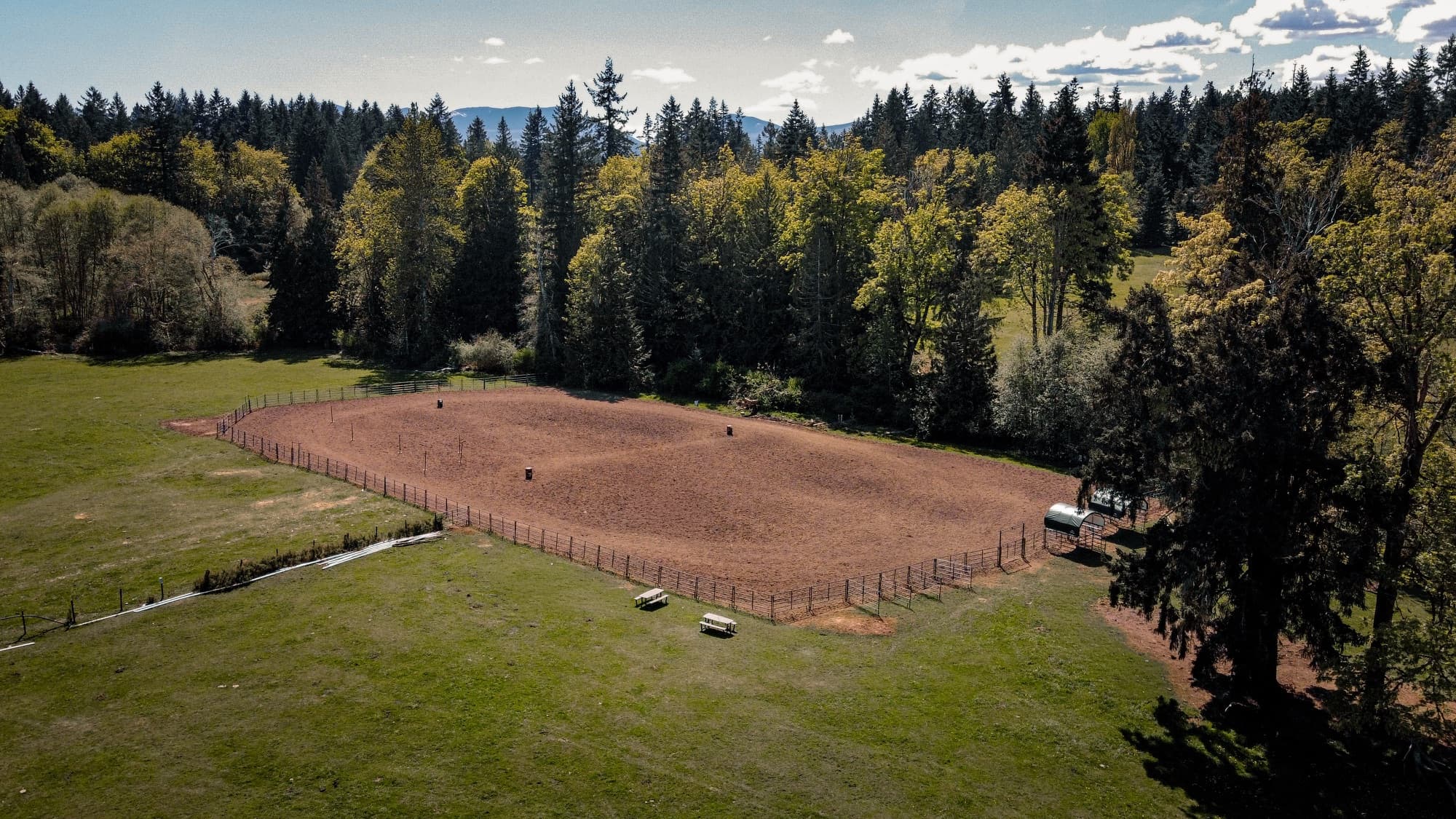 Aerial of the Simmons Quarter Horses arena and pasture